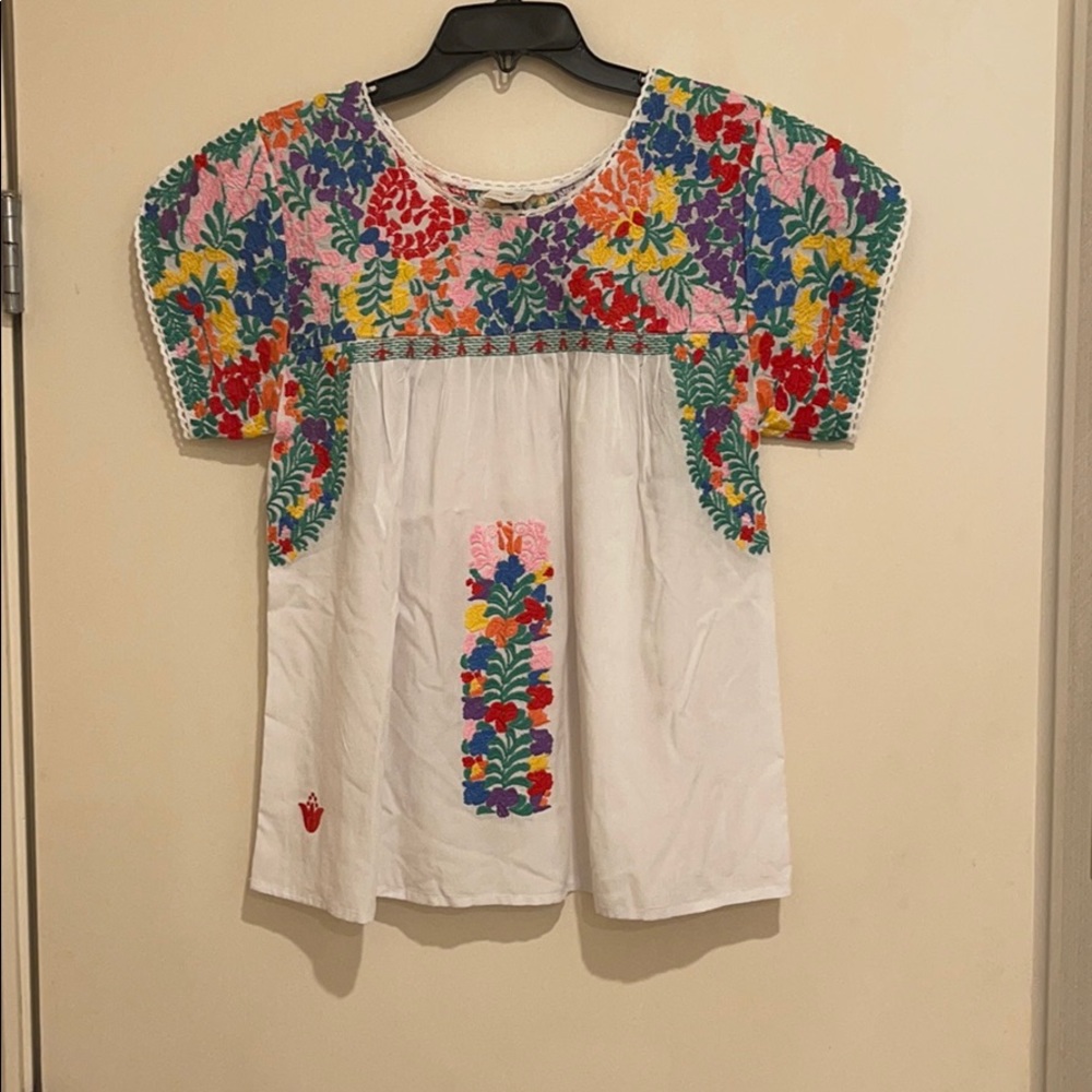 J. Marie top